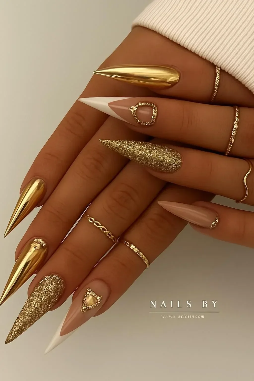 Gorgeous gold chrome nails showcasing elegant designs for stylish manicures.
