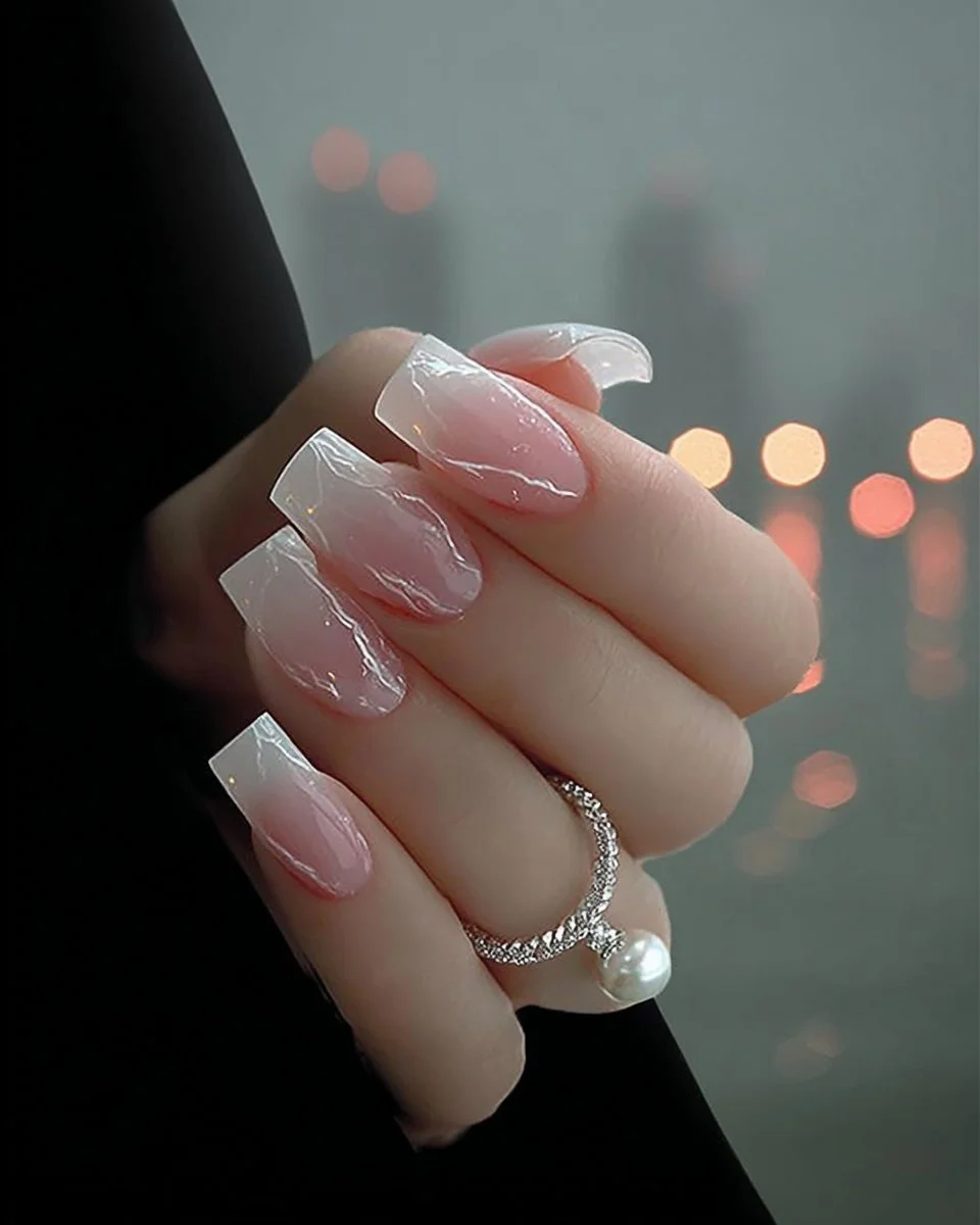 Elegant milky pink nails with a soft look for a chic manicure
