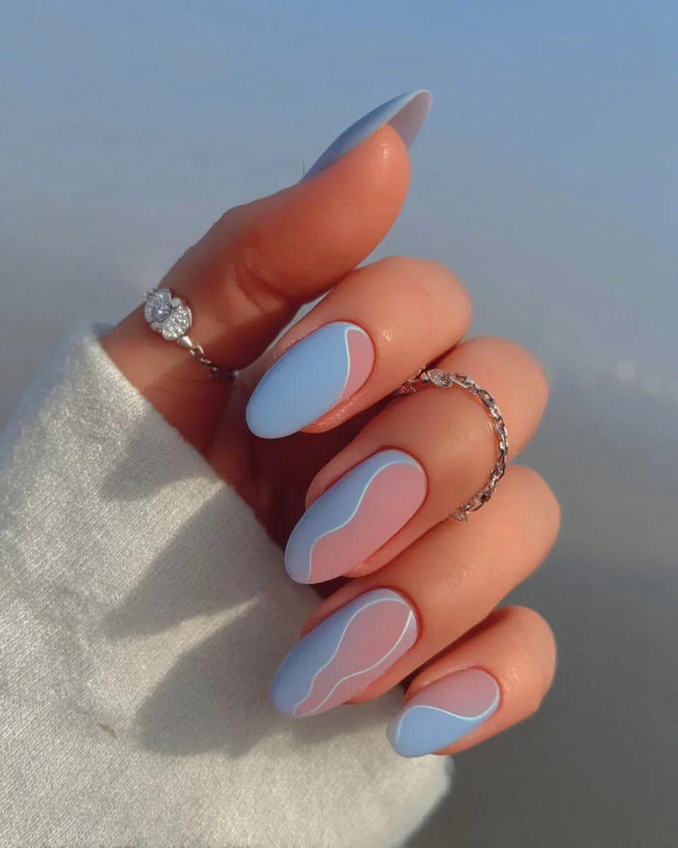 Stylish light blue nail designs for 2026 featuring chic patterns and ideas.