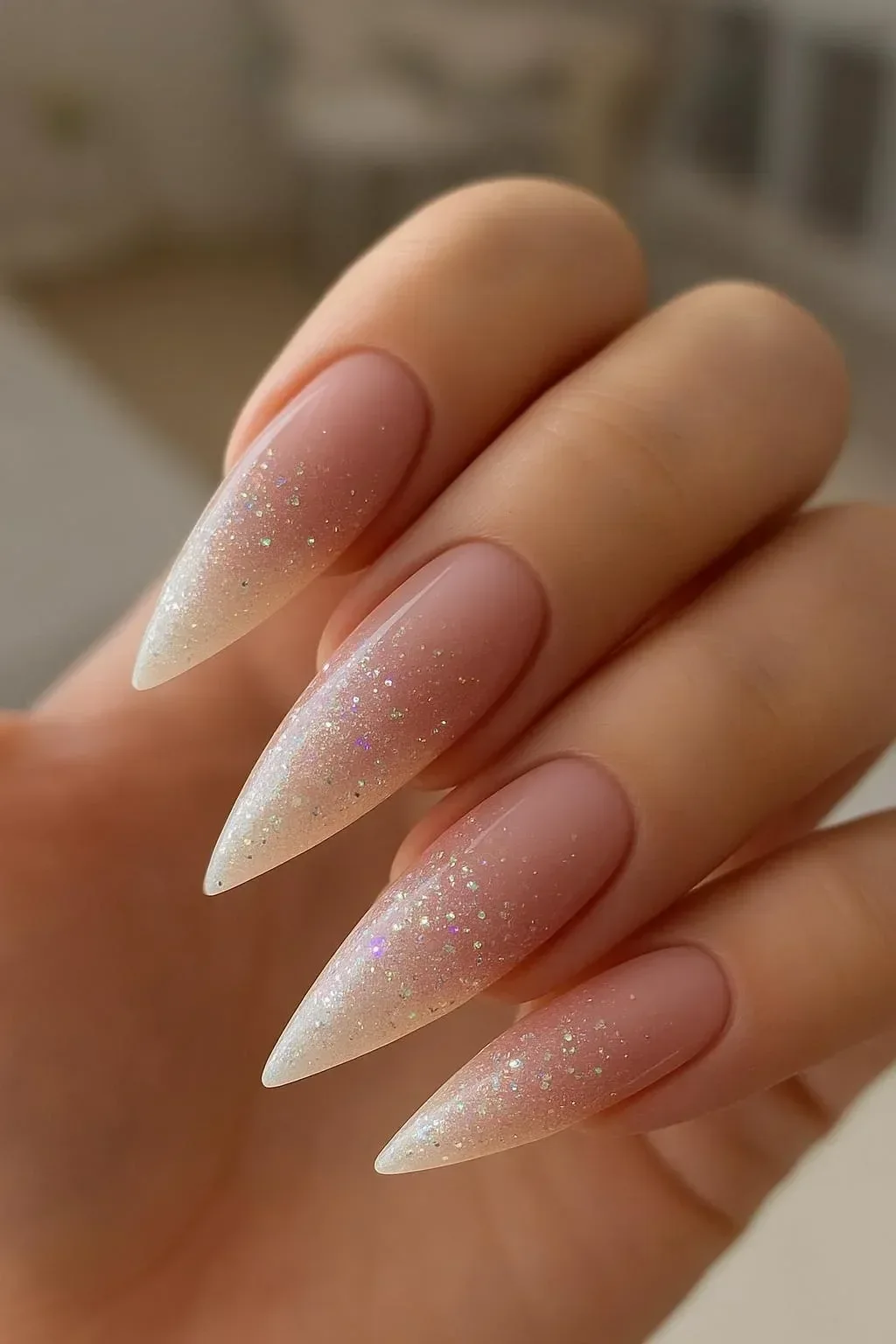 Glamorous pink and white ombre nails with glitter designs for inspiration.
