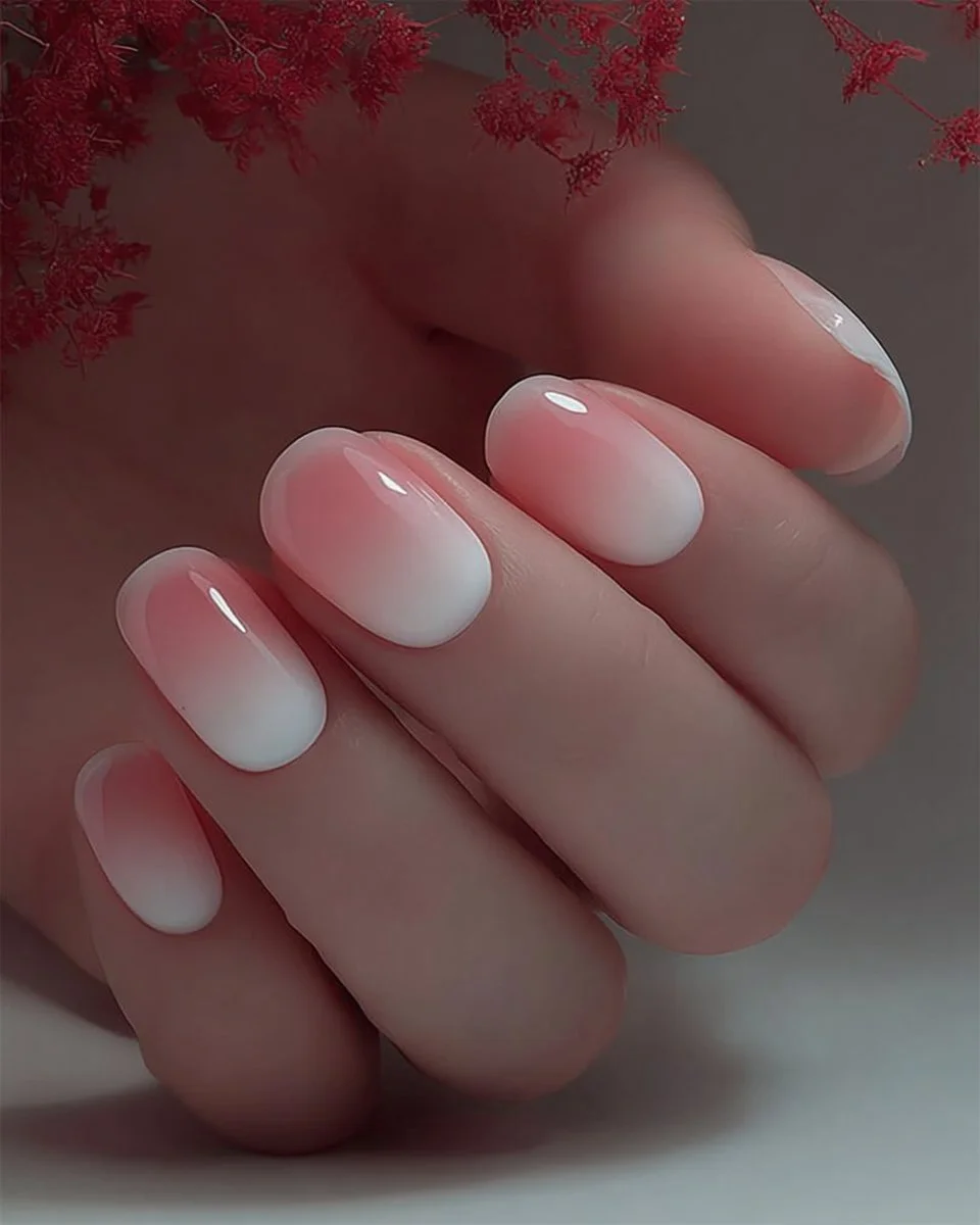 Spring Gel Nails showcasing short pink, blue, and purple blooming designs for 2025.