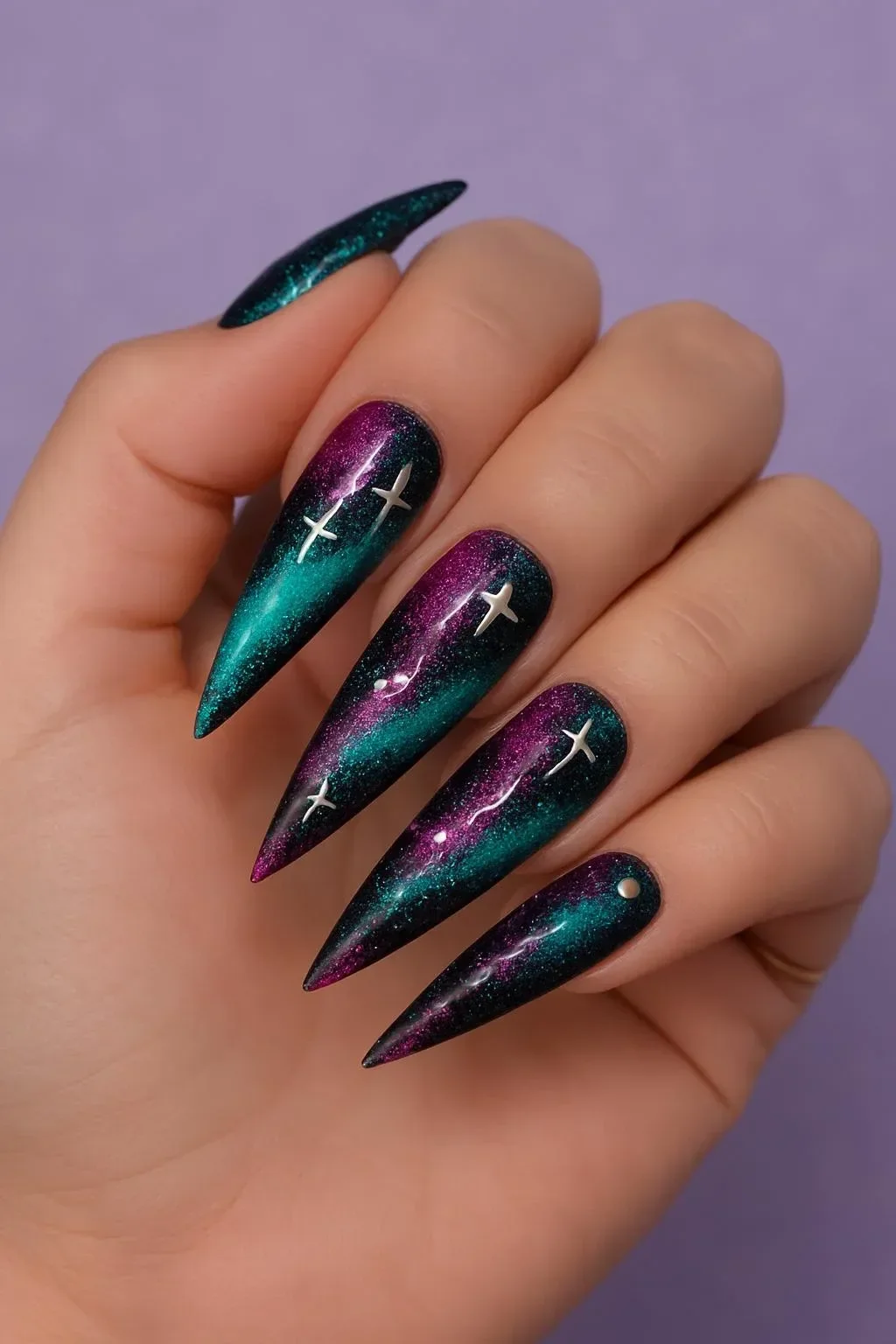 Stylish cat eye nails created using cat eye gels, showcasing a stunning effect.