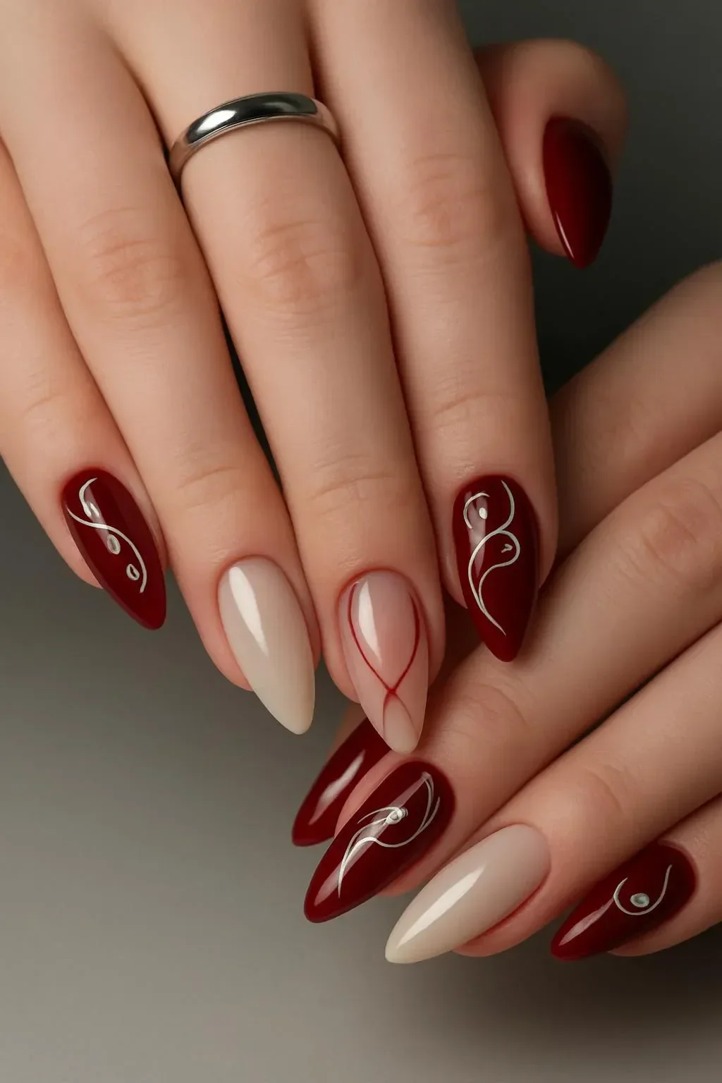 Gothic manicure featuring Black Cherry & Chrome Cyber-Sigilism design.