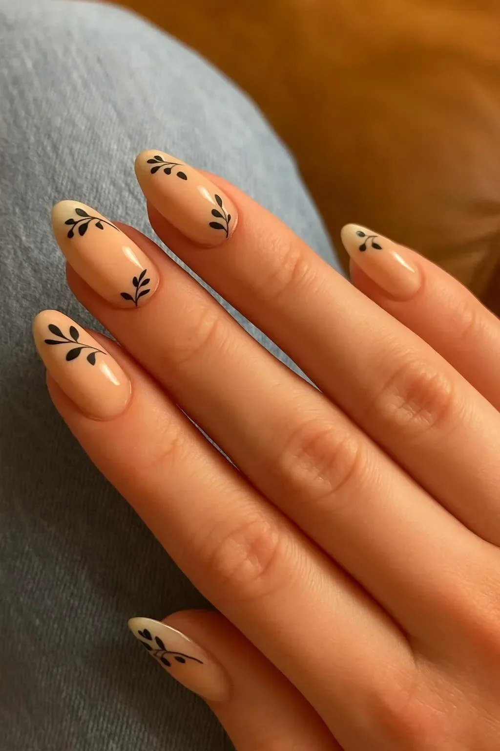 Stunning celestial gold chrome and nude almond nails design.