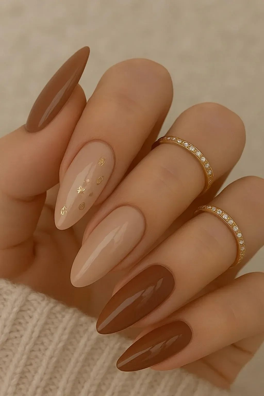 Elegant almond nail designs featuring fall themes and colors.