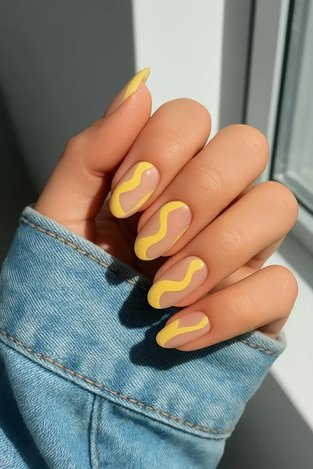 Cute yellow wave spring oval nails design for 2026