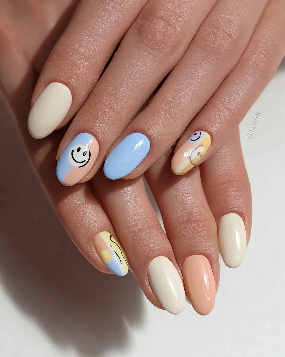 Neutral Smiley Face Nail Design for Summer 2023 showcasing cheerful nail art.