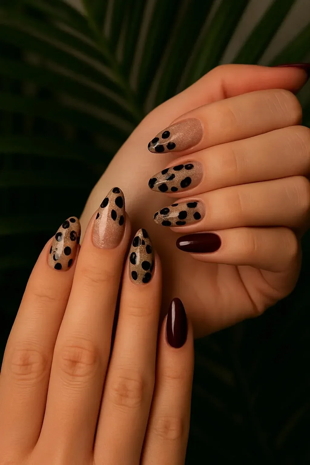 Nude leopard print nails featuring chocolate brown design.