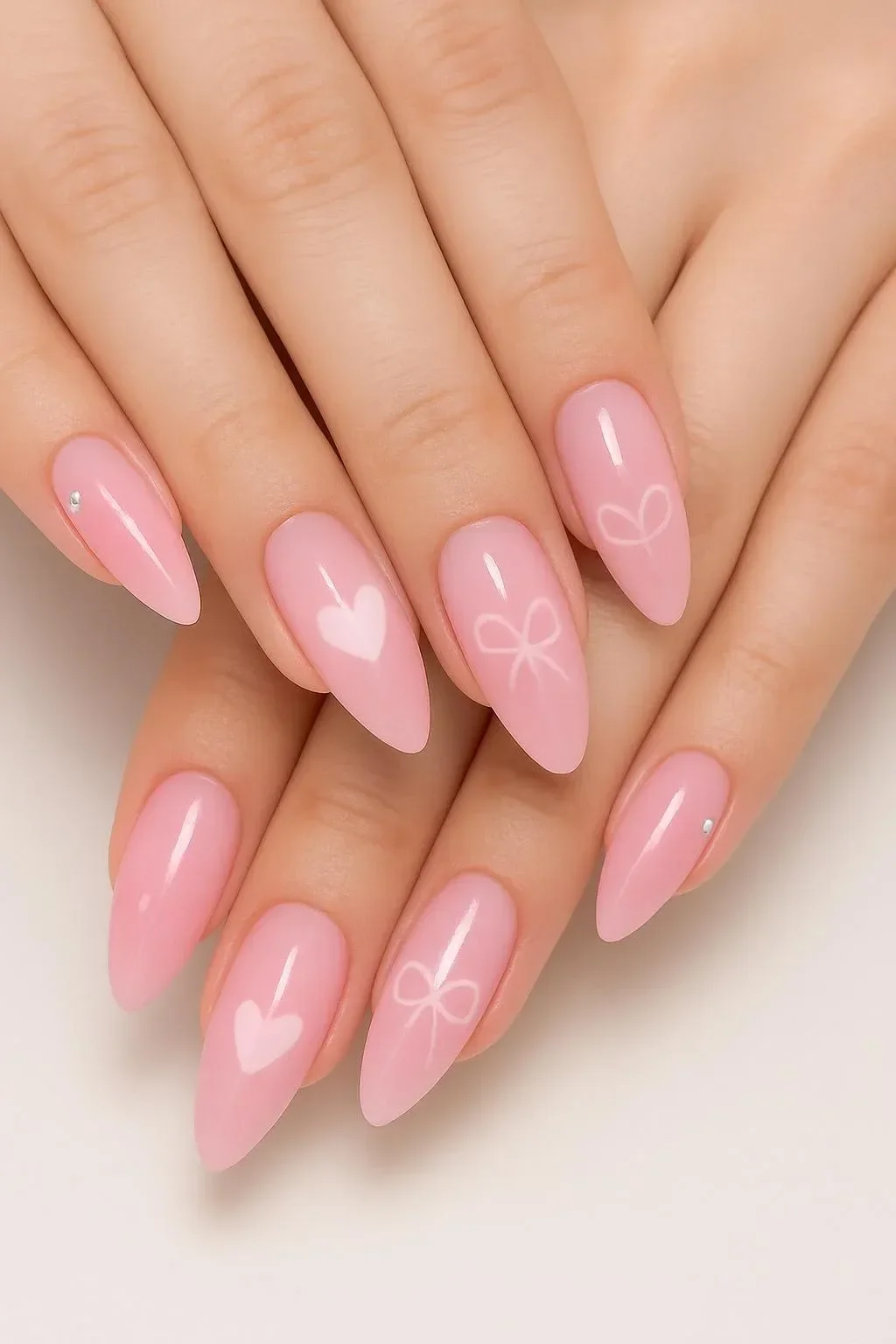 Beautiful gel nails with pink and heart designs