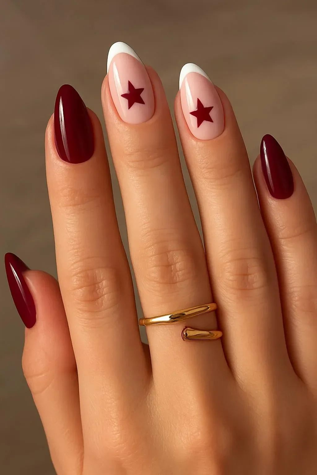 Beautiful maroon nail looks for fall season with creative designs.