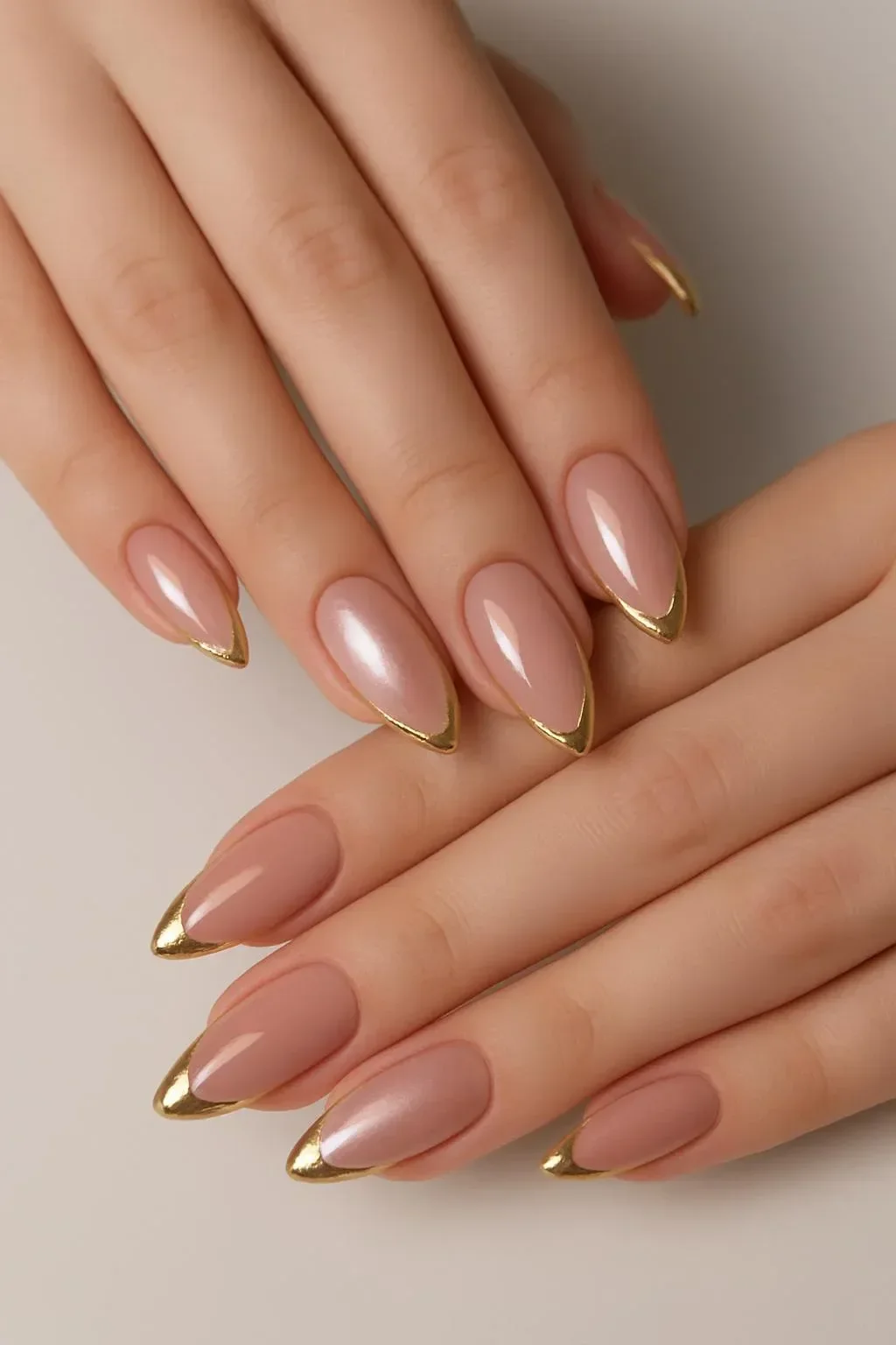 Elegant gold French tip nails design for a chic manicure