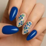 Beautiful blueberry nails showcasing a trendy nail art design with blue hues.