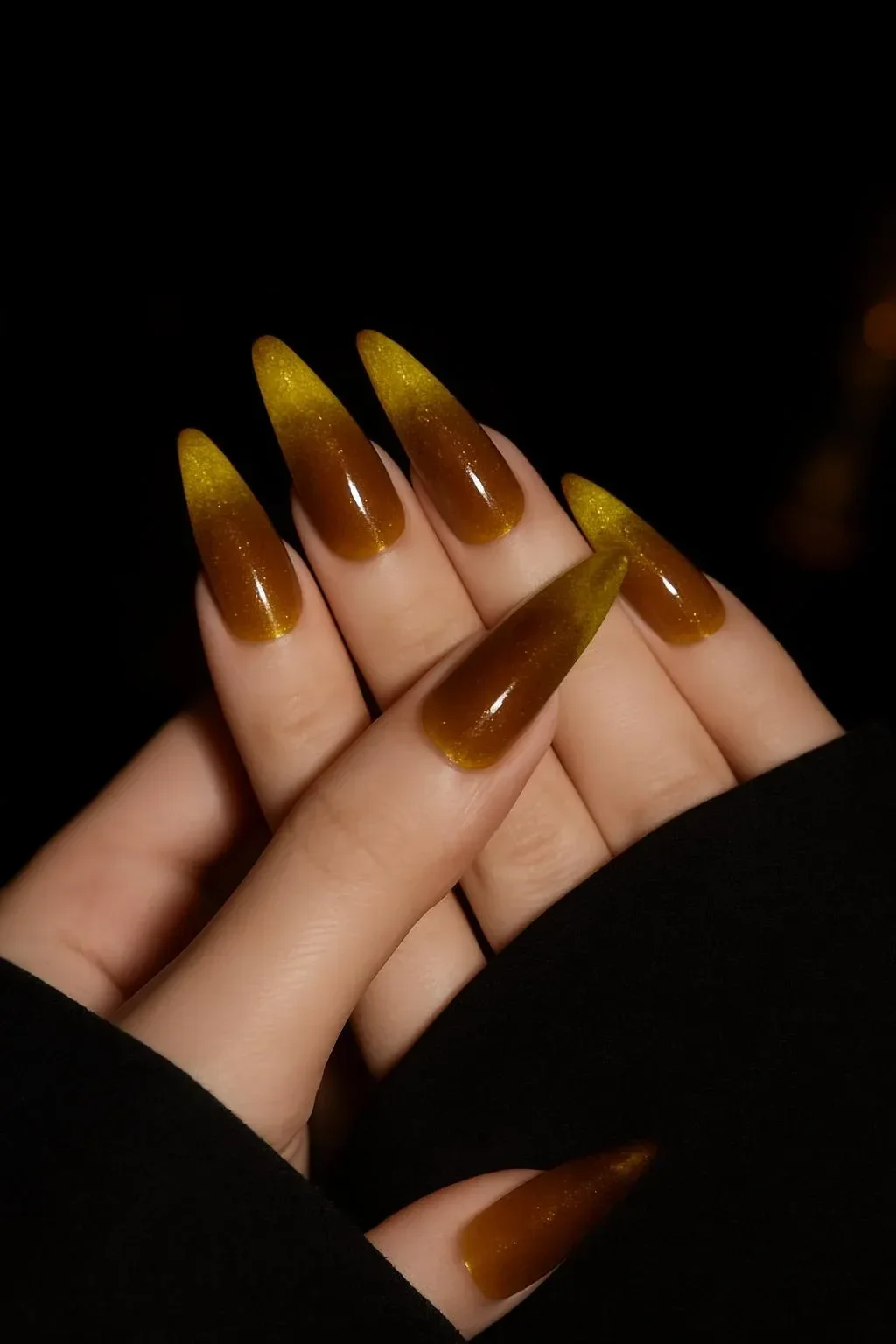 Soft ombre gold blend from deep bronze to bright molten gold with shimmer.