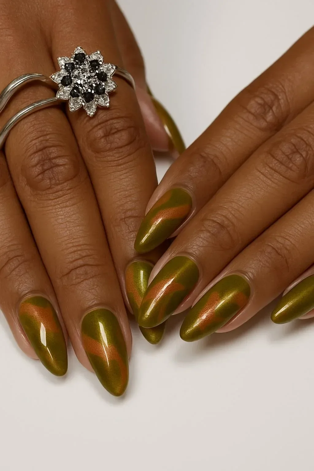 Masterpiece cat eye camo nails by Marina Mansour on Instagram