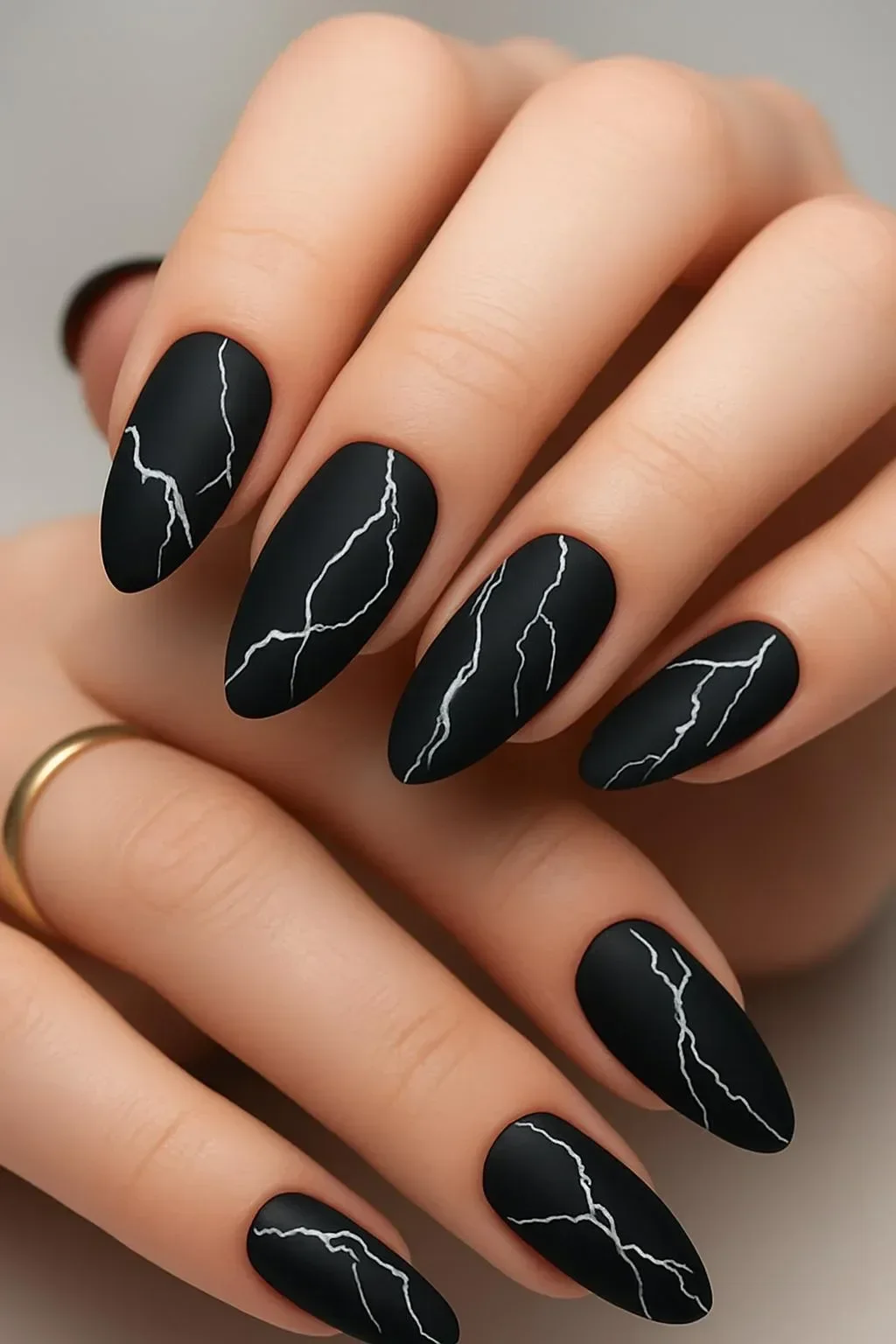 Matte black marble with sage green and earthy tones showcasing elegant interior design