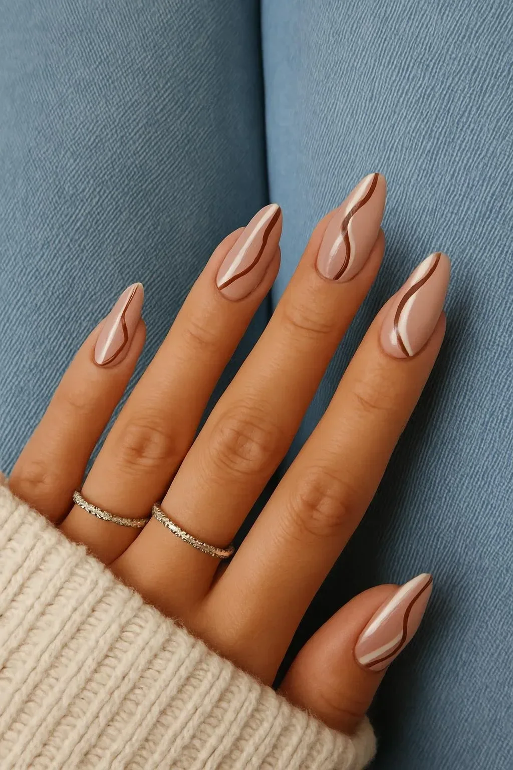 Close-up of elegant nude nails perfect for autumn fashion