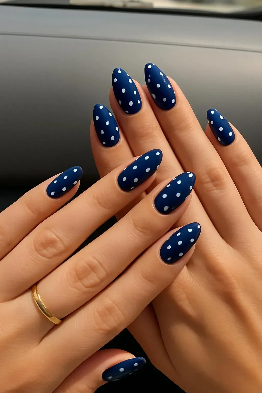 Trendy nail designs showcasing blue and acrylic nails for stylish manicures.