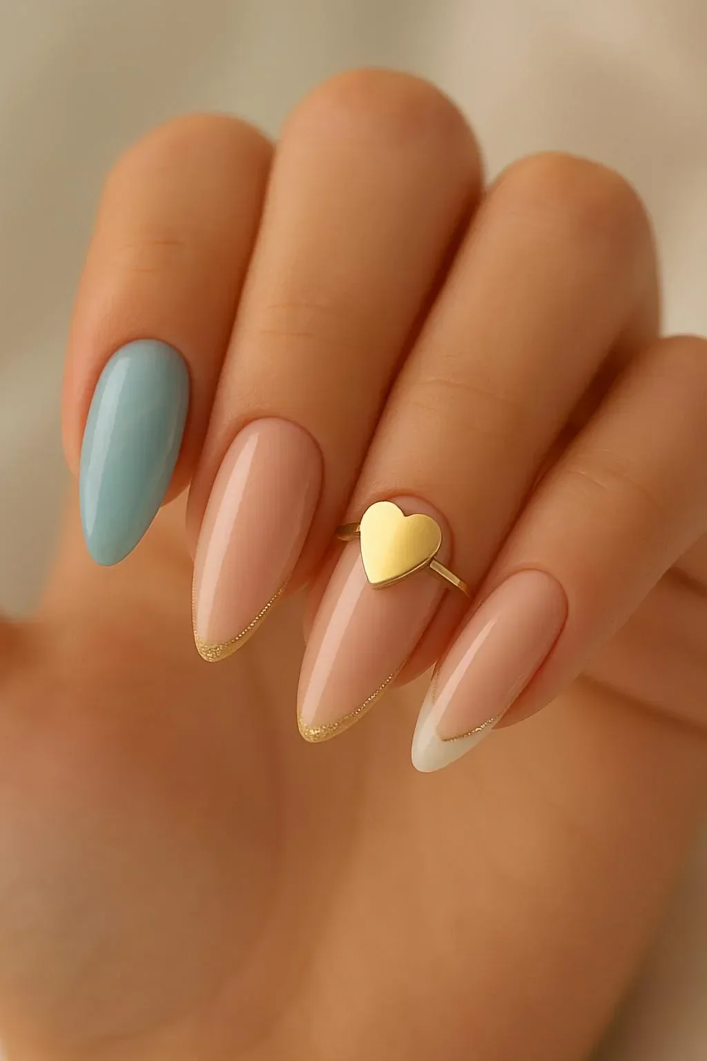 Stylish blue minimalist nails with unique designs for a chic look