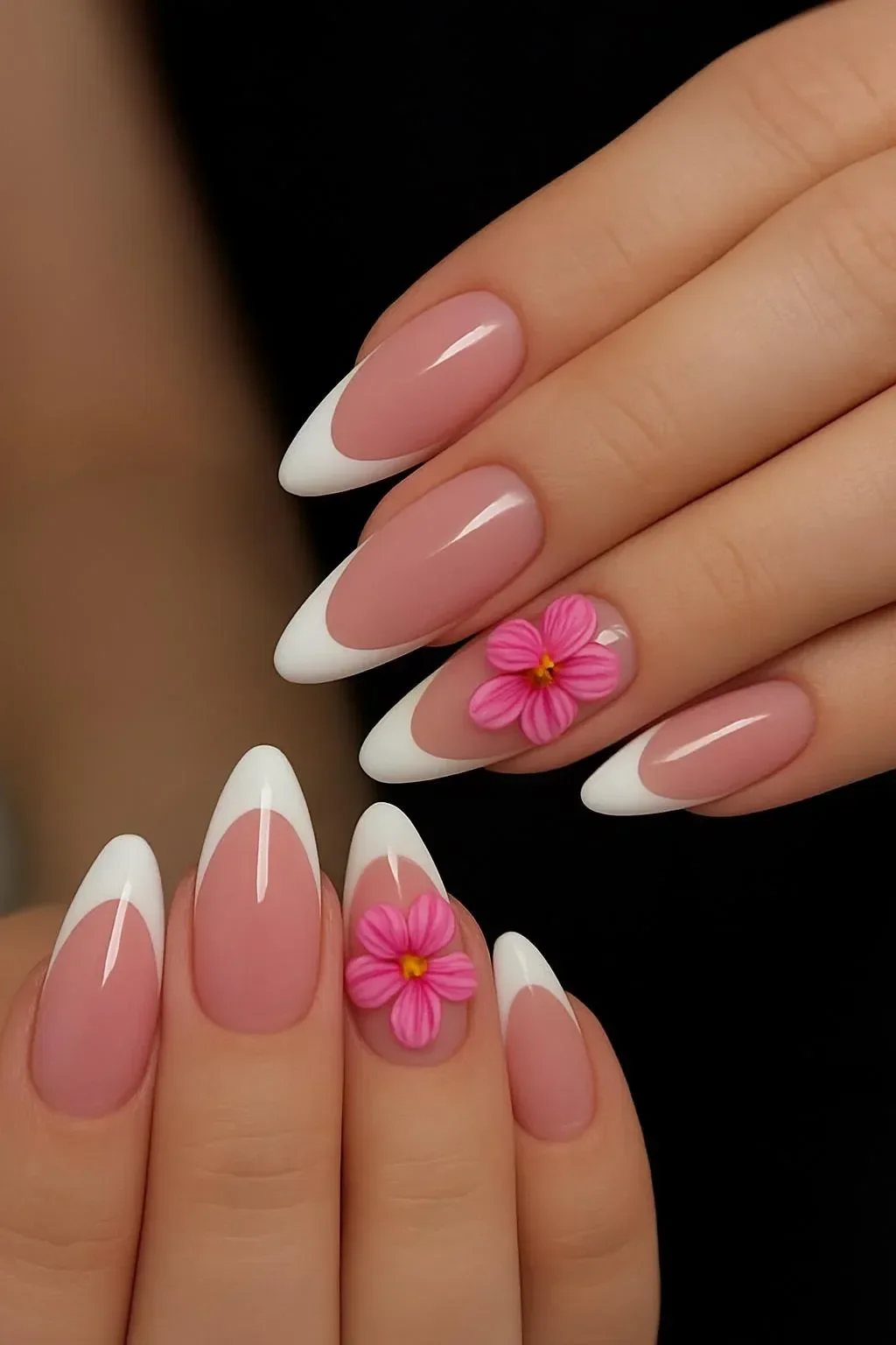 Pink floral French tip press on nails for a stylish manicure.