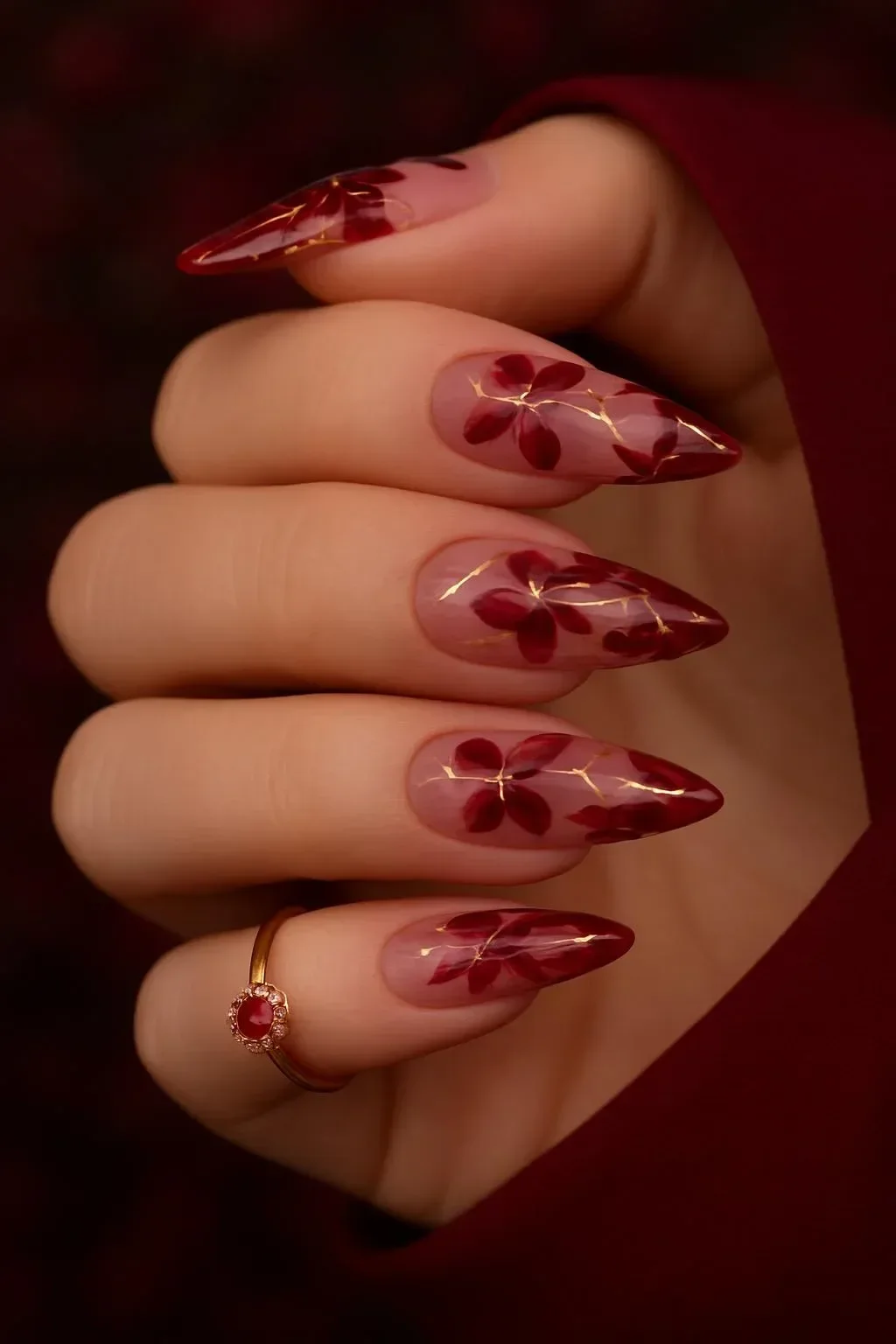 Red wine velvet floral nails design with rose accents