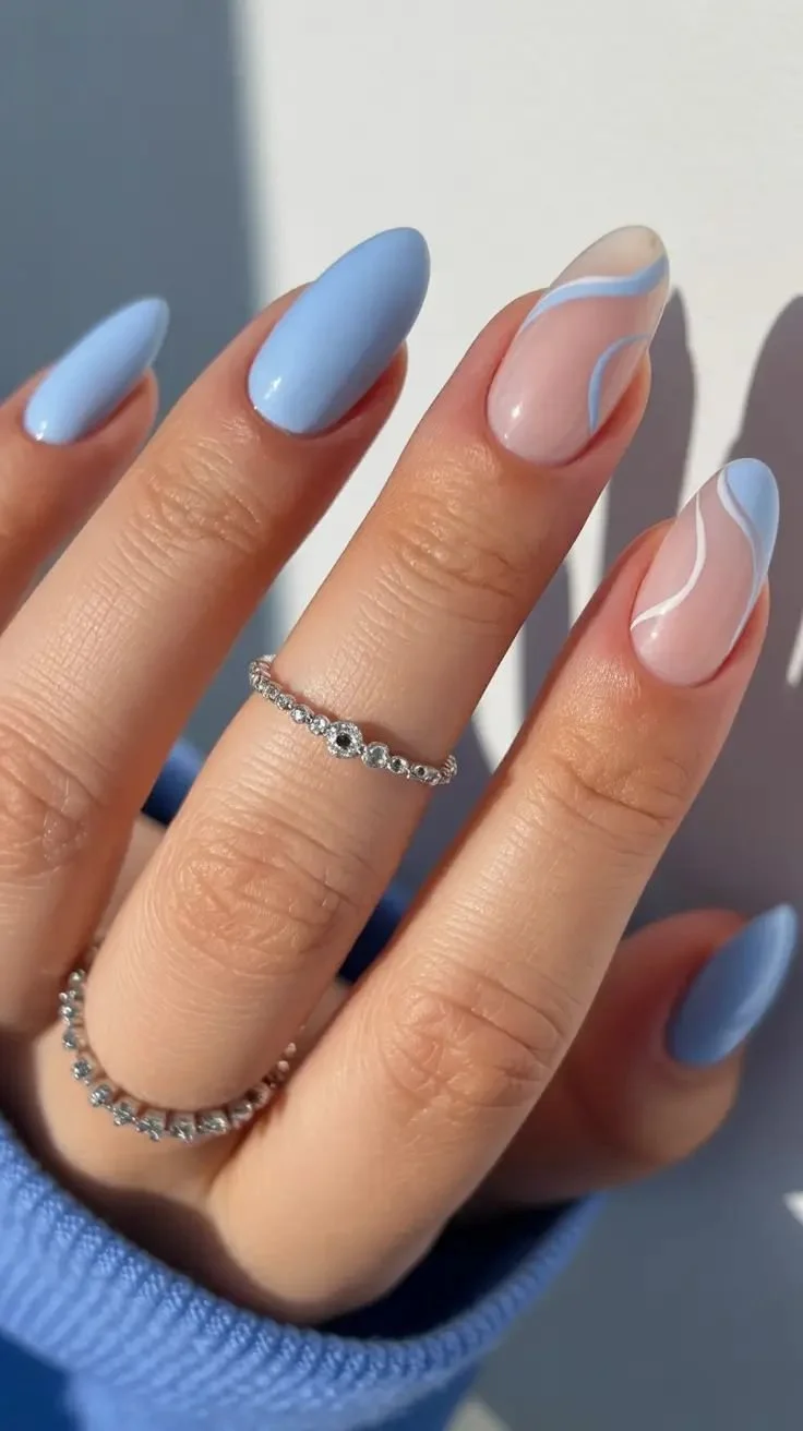 Chic light blue nail designs showcasing trendy styles for 2026