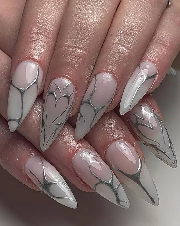 Adlu.nails showcasing stylish milky gel nail designs by a professional nail artist.