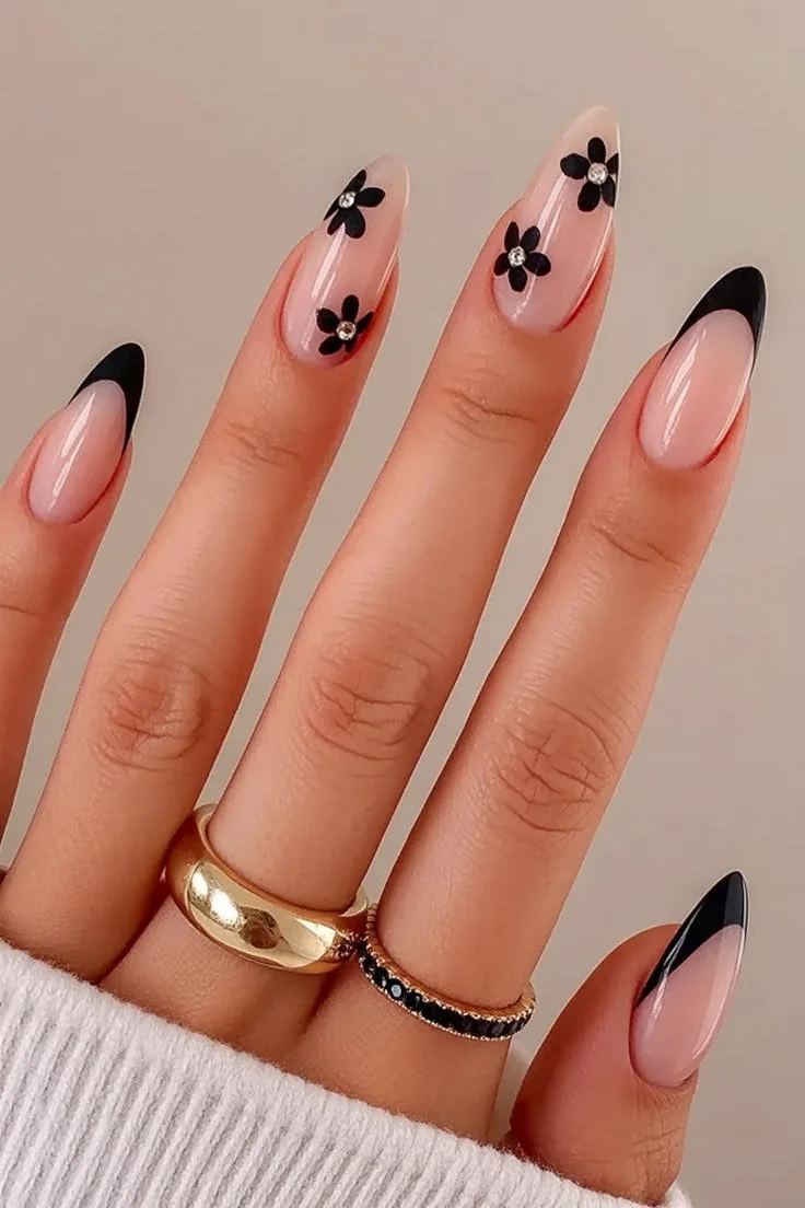 French Almond featuring elegant black tips and beautiful floral details.