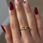 Elegant maroon nail looks for fall showcasing various trendy designs.